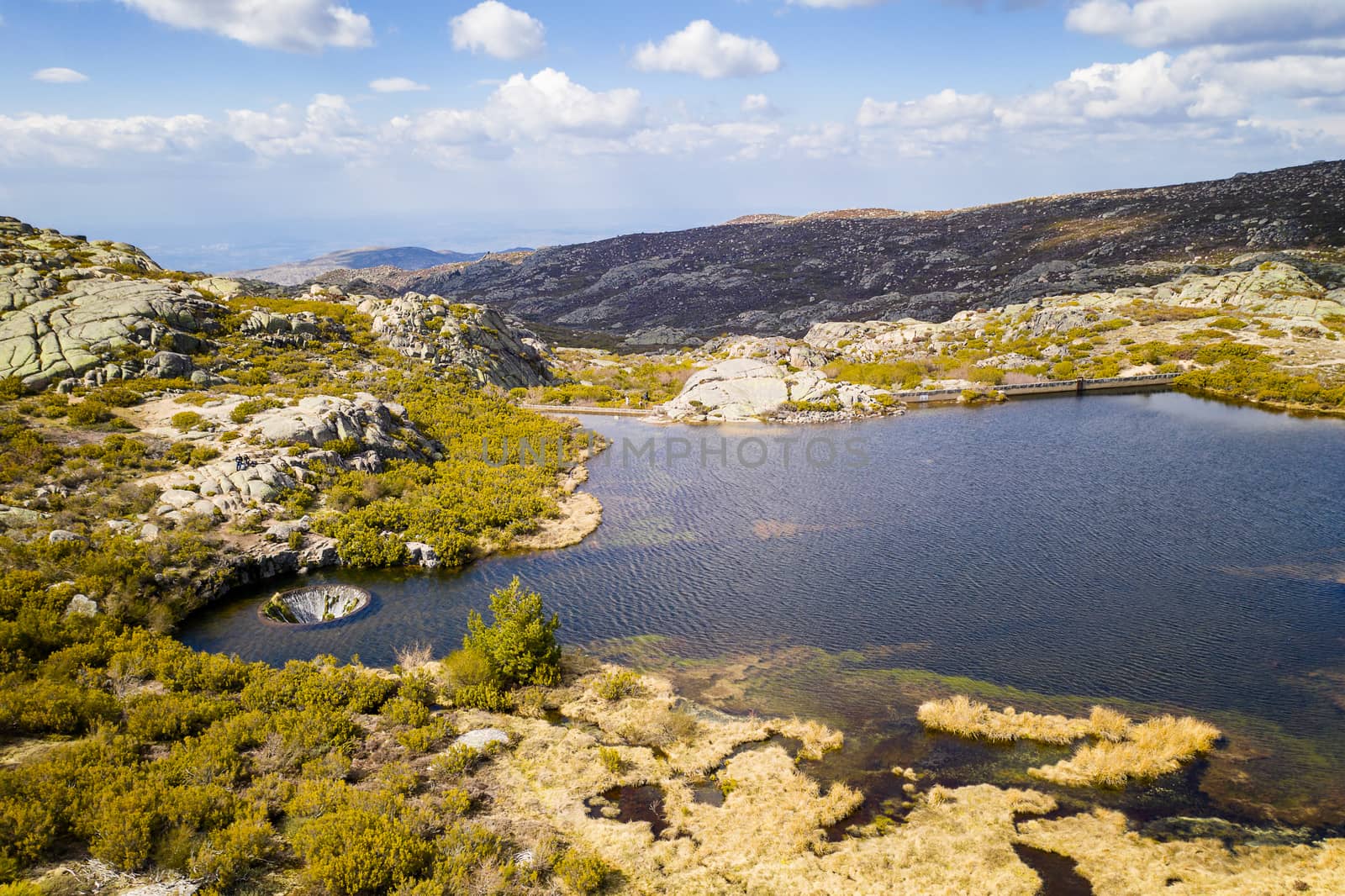 Drone aerial view of landscape in Covao dos Conchos in Serra da Estrela, Portugal by Luispinaphotography