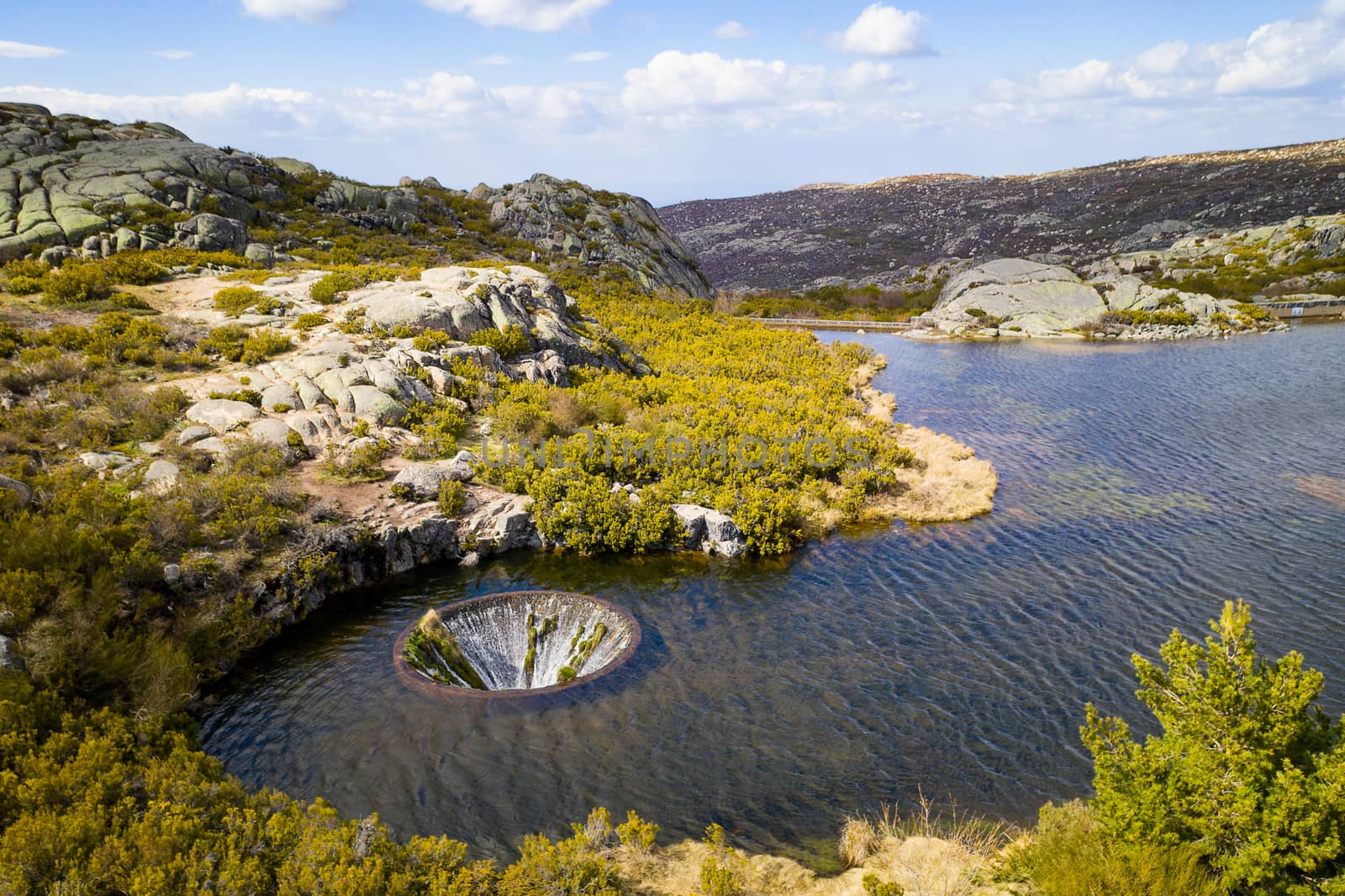 Drone aerial view of landscape in Covao dos Conchos in Serra da Estrela, Portugal by Luispinaphotography