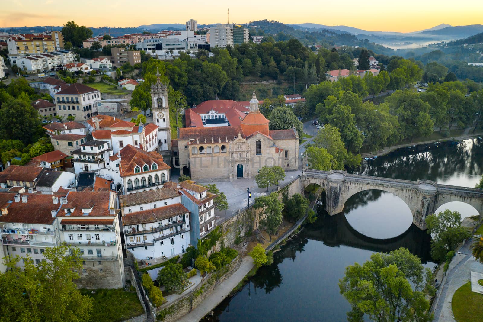 Amarante drone aerial view with beautiful church and bridge in Portugal at sunrise by Luispinaphotography