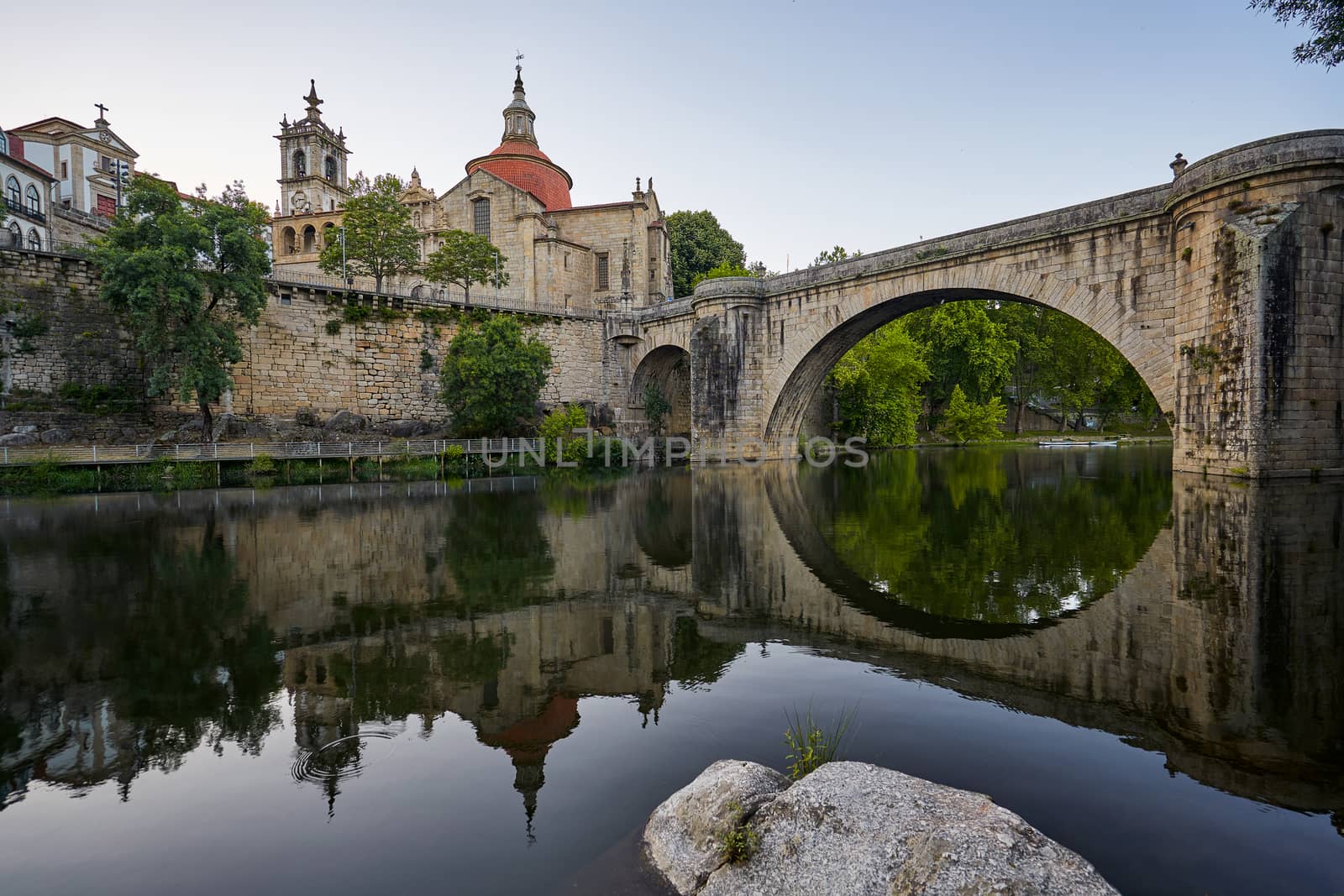 Amarante church view with Sao Goncalo bridge at sunset, in Portugal by Luispinaphotography