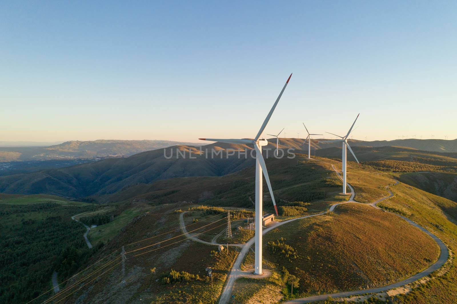 Wind turbines drone aerial view renewable energy on the middle of Serra da Freita Arouca Geopark, in Portugal