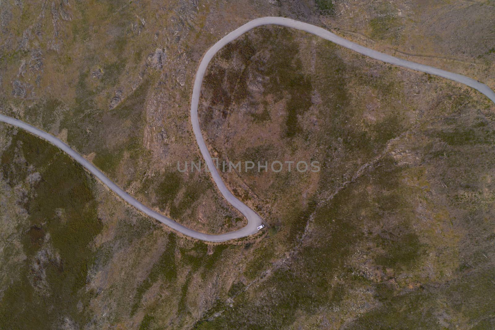 Serra da Freita drone aerial top view in Arouca Geopark road at sunset, in Portugal by Luispinaphotography