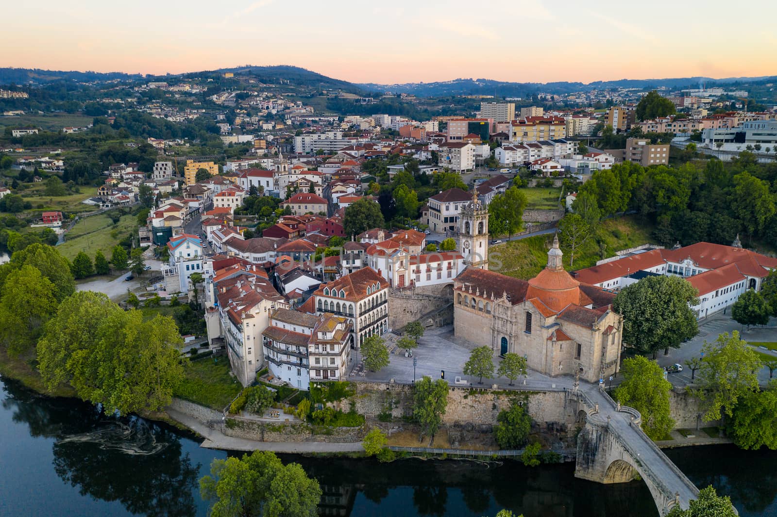 Amarante drone aerial view with beautiful church and bridge in Portugal at sunrise by Luispinaphotography