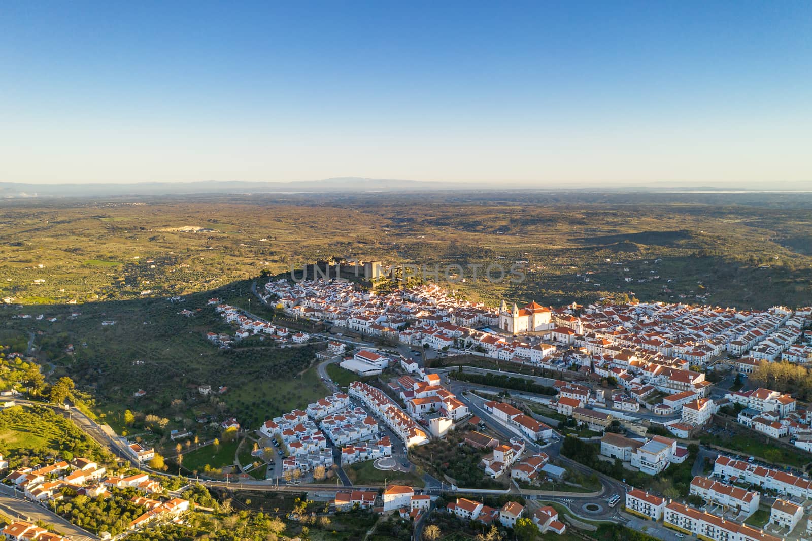 Castelo de Vide drone aerial view in Alentejo, Portugal from Serra de Sao Mamede mountains by Luispinaphotography