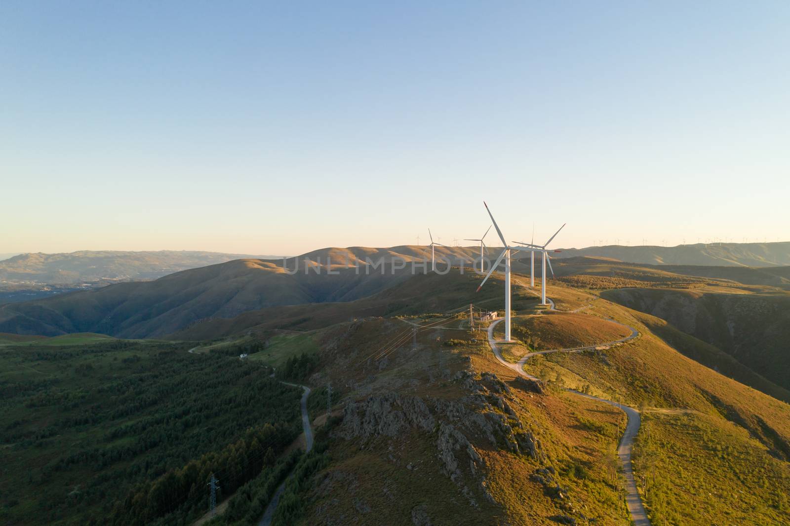 Wind turbines drone aerial view renewable energy on the middle of Serra da Freita Arouca Geopark, in Portugal