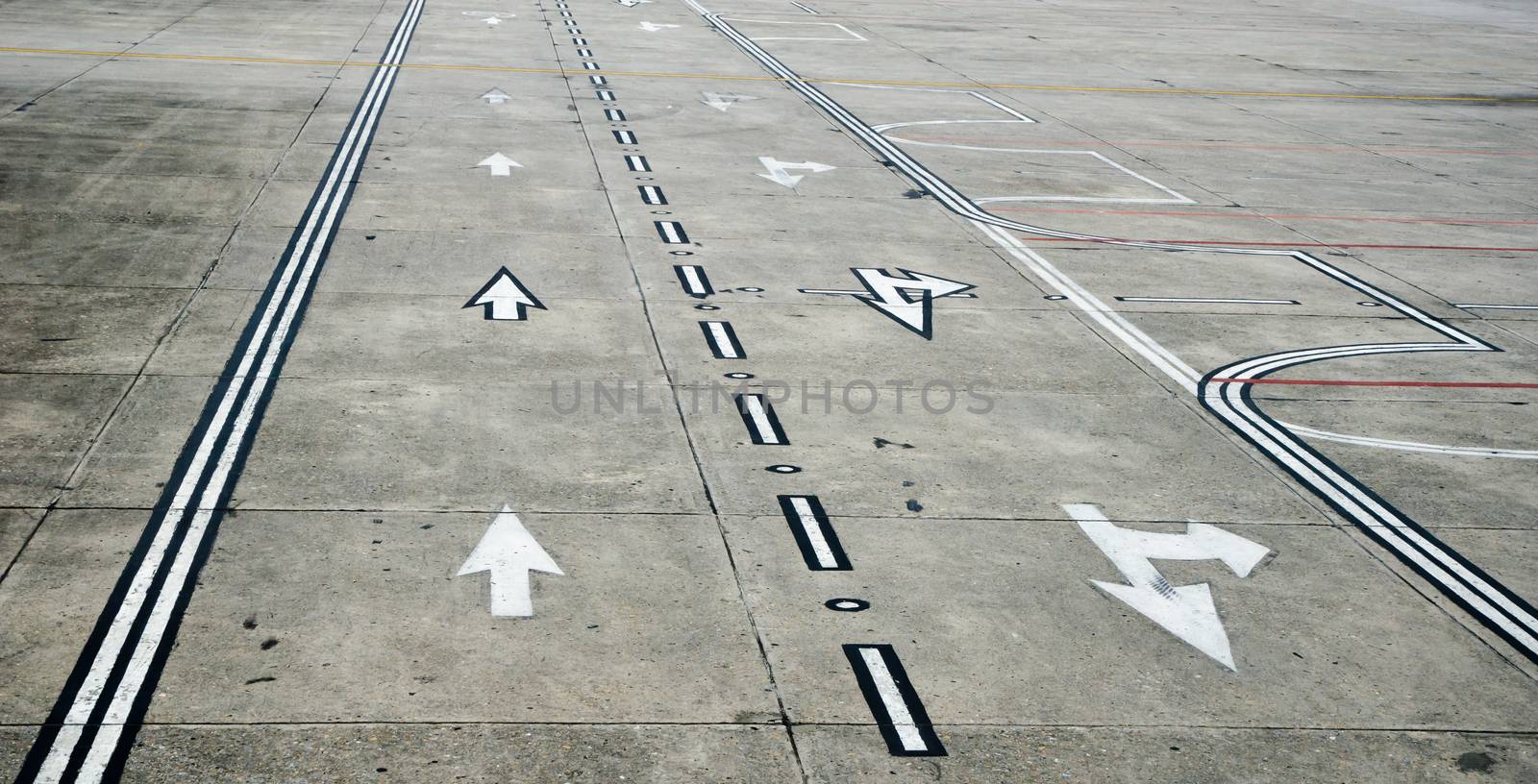 Aged Kathmandu airport runway with direction signs