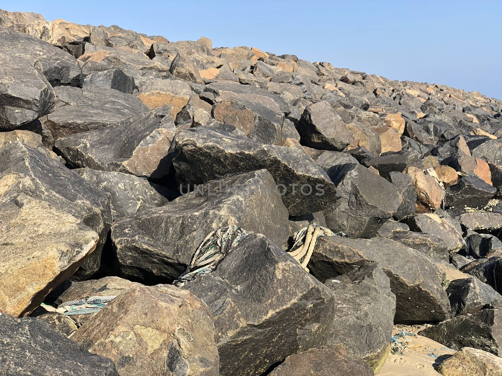 Rocks in the seashore of the Ennore beach, Tamil nadu by prabhakaran851