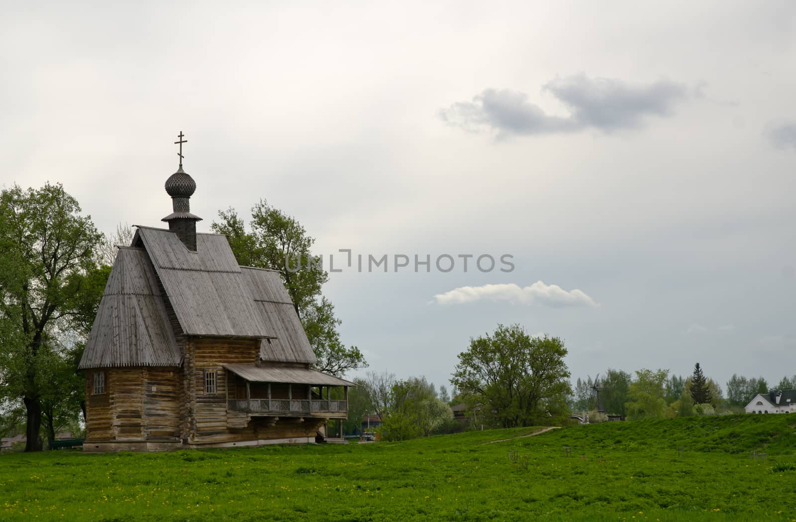 Ancient wooden christian church on a hill by nemo269