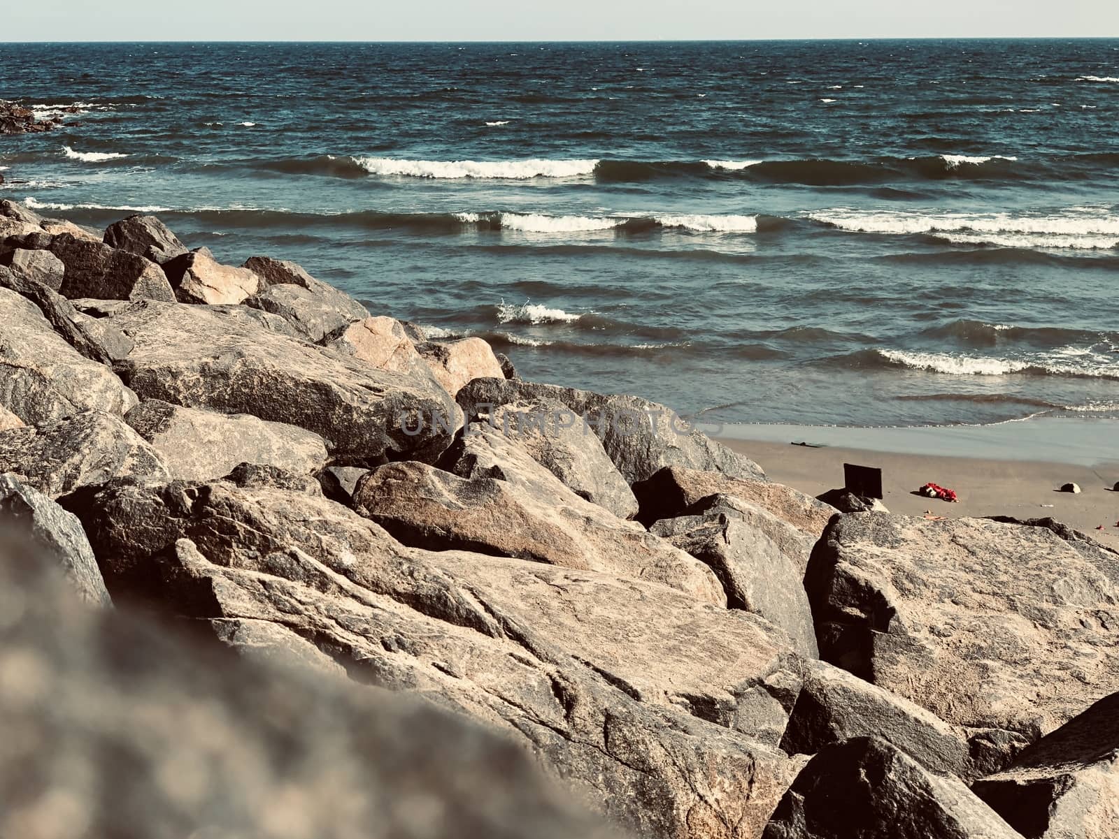 Sea waves on the beach with rocks on the shore at Ennore beach, Tamil nadu by prabhakaran851