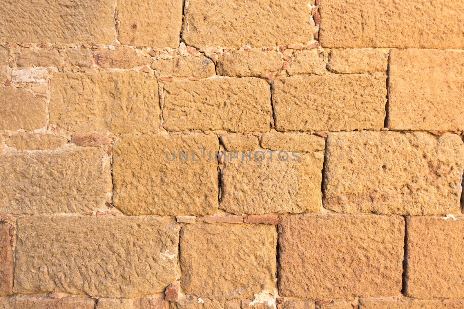 Close up view of an ancient smooth textured brick wall by nemo269