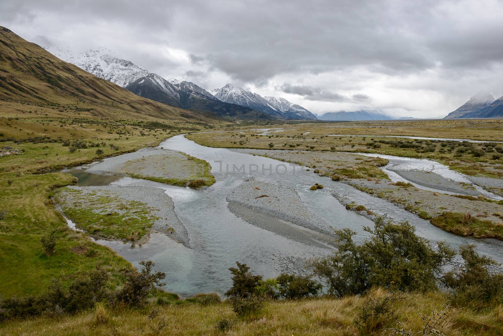 Tasman River valley and depressing cloudscape neat Mount Cook, New Zealand