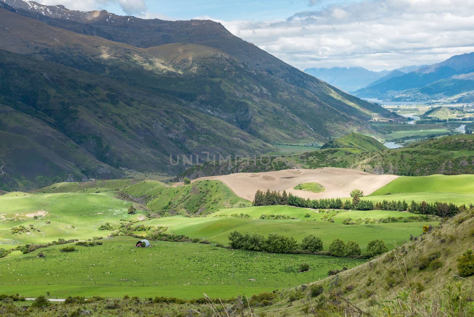 Sunny valley view from the Crown Range Road Scenic Lookout Point near Queenstown by nemo269