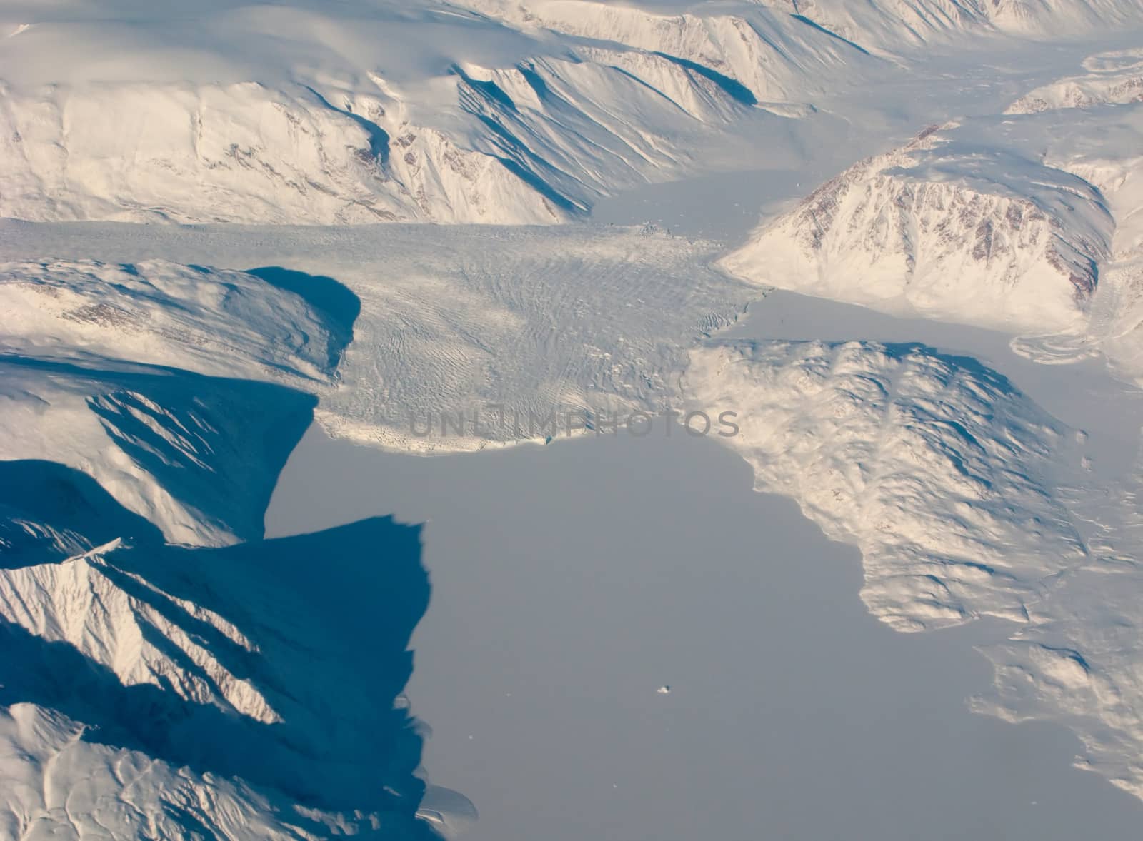 Aerial view of the Greenland with mountain and snow river