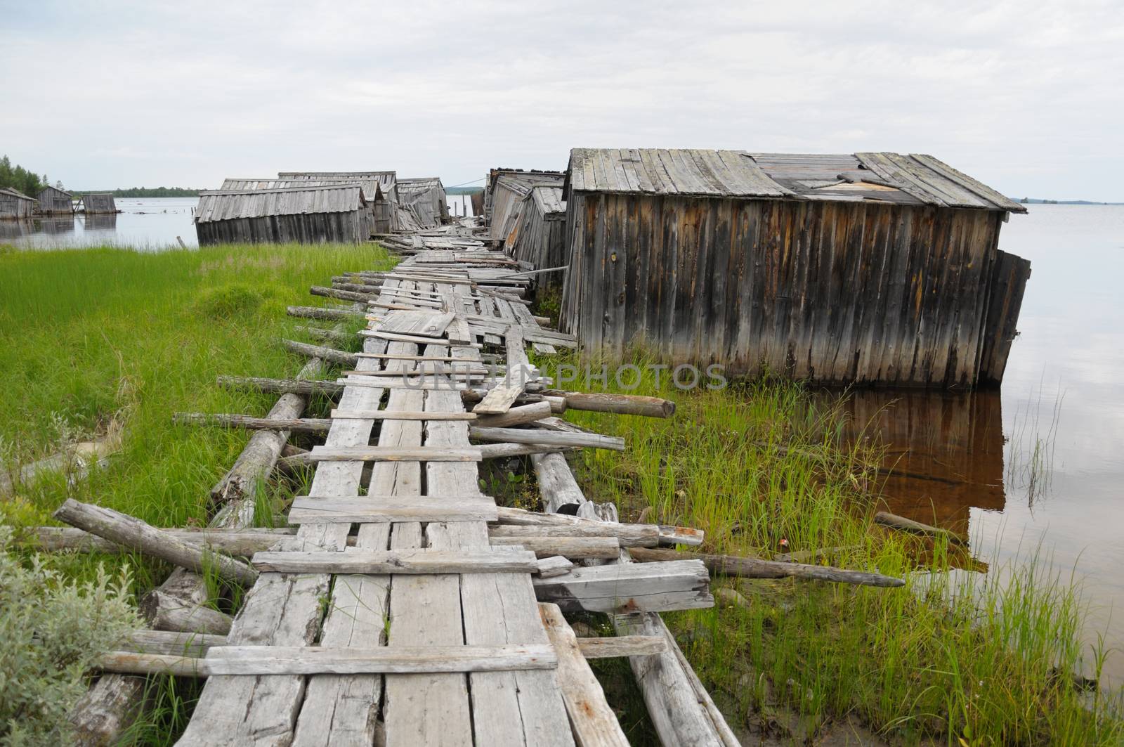 The picture shows abandoned and broken slip docs in a small settlement in Russia's Karelia region