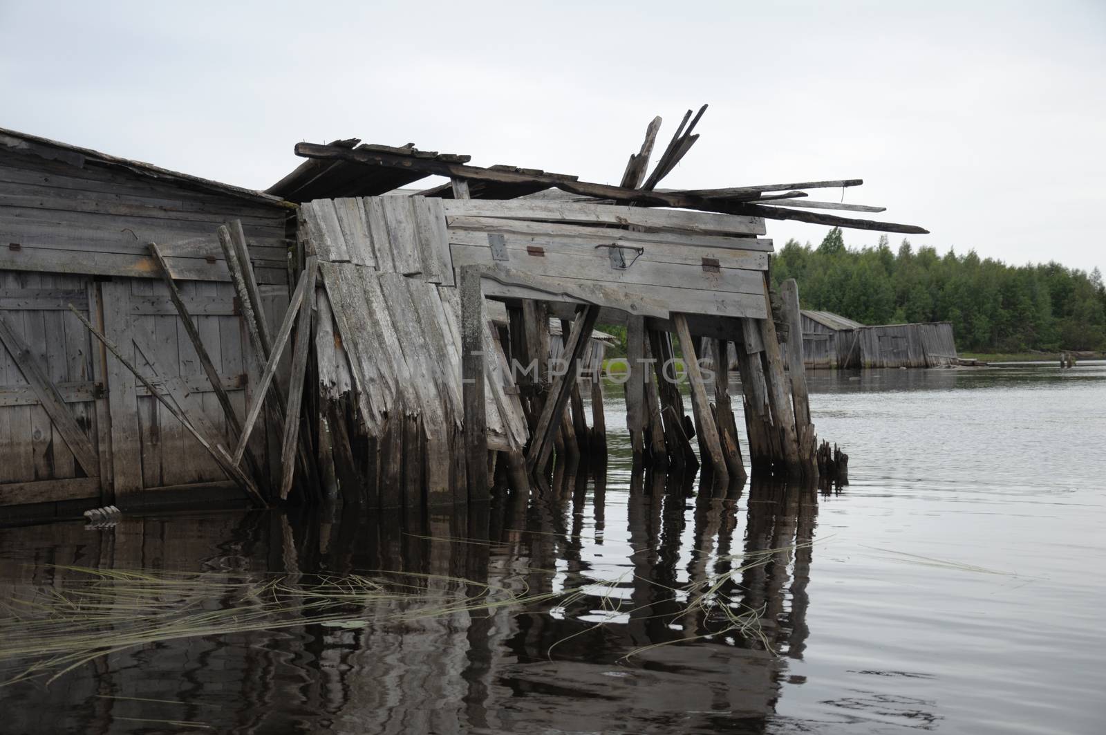The picture shows abandoned and broken slip docs in a small settlement in Russia's Karelia region