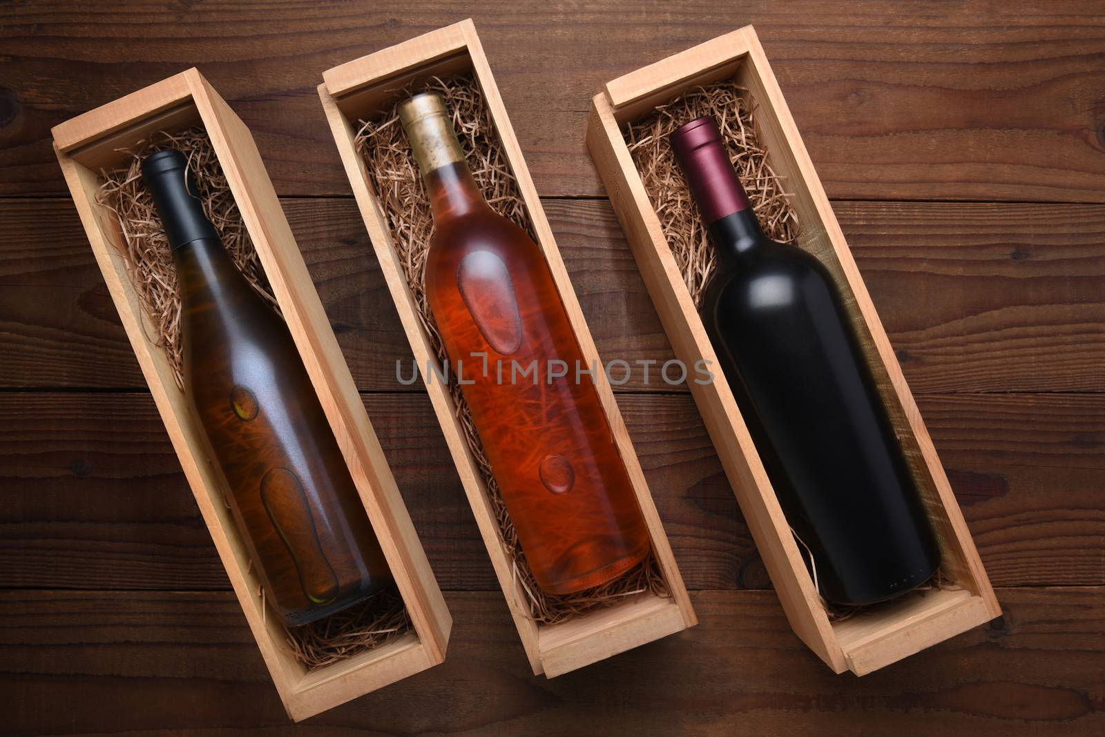 Cabernet and Chardonnay wine bottles in individual cases by sCukrov