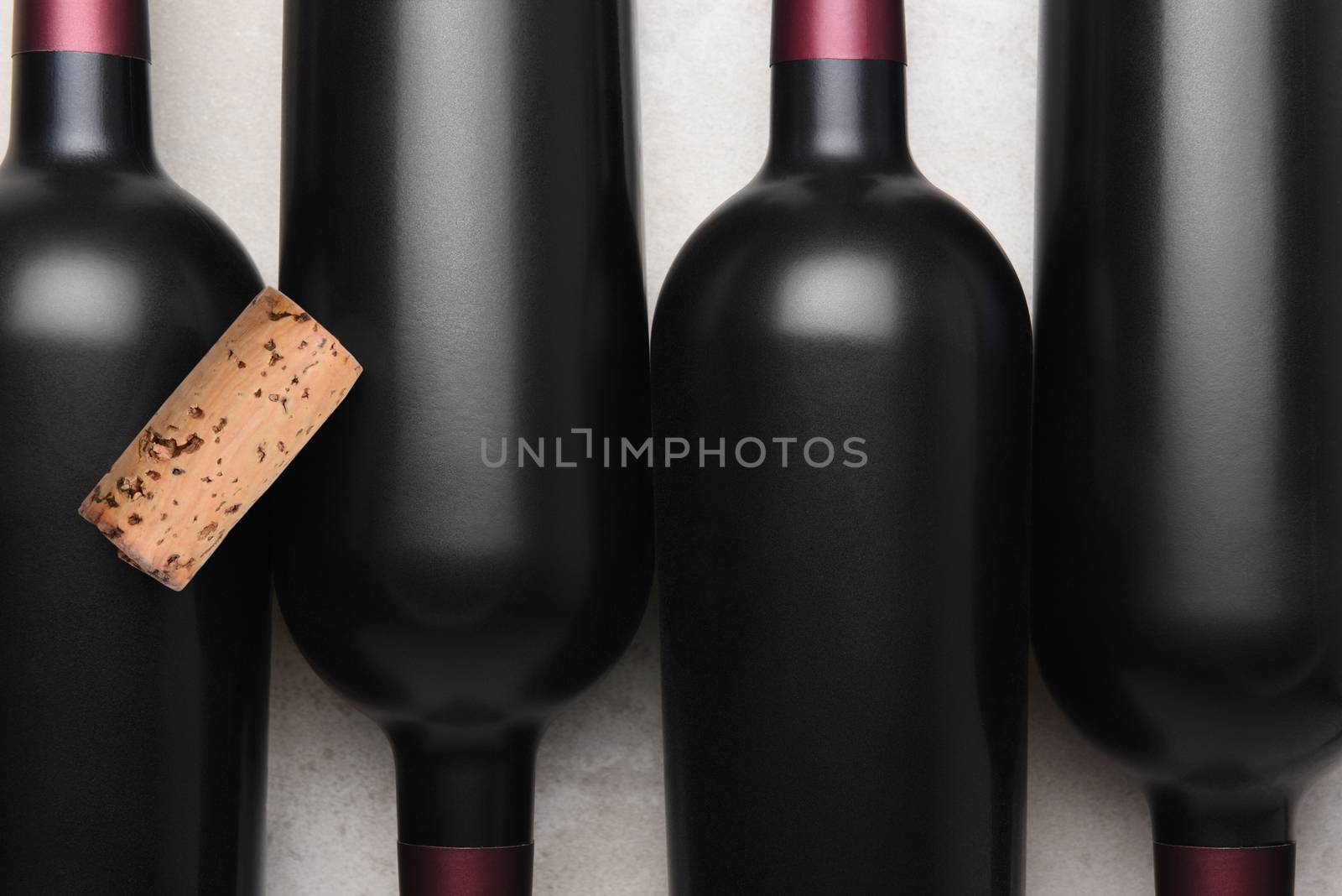 Wine Cork on top of bottles of red wine.