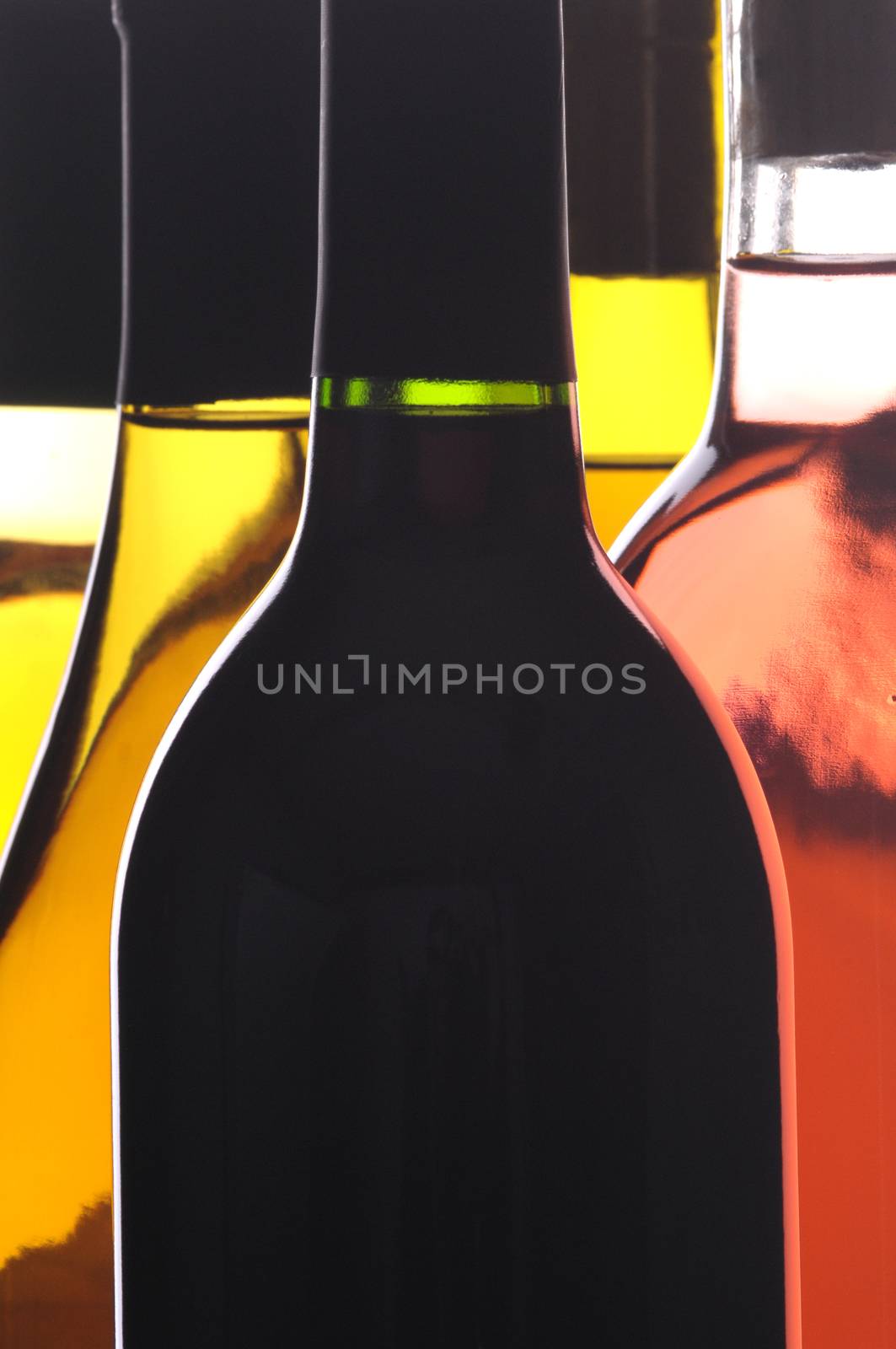 Abstract Close up of Five Different Wine Bottles vertical format