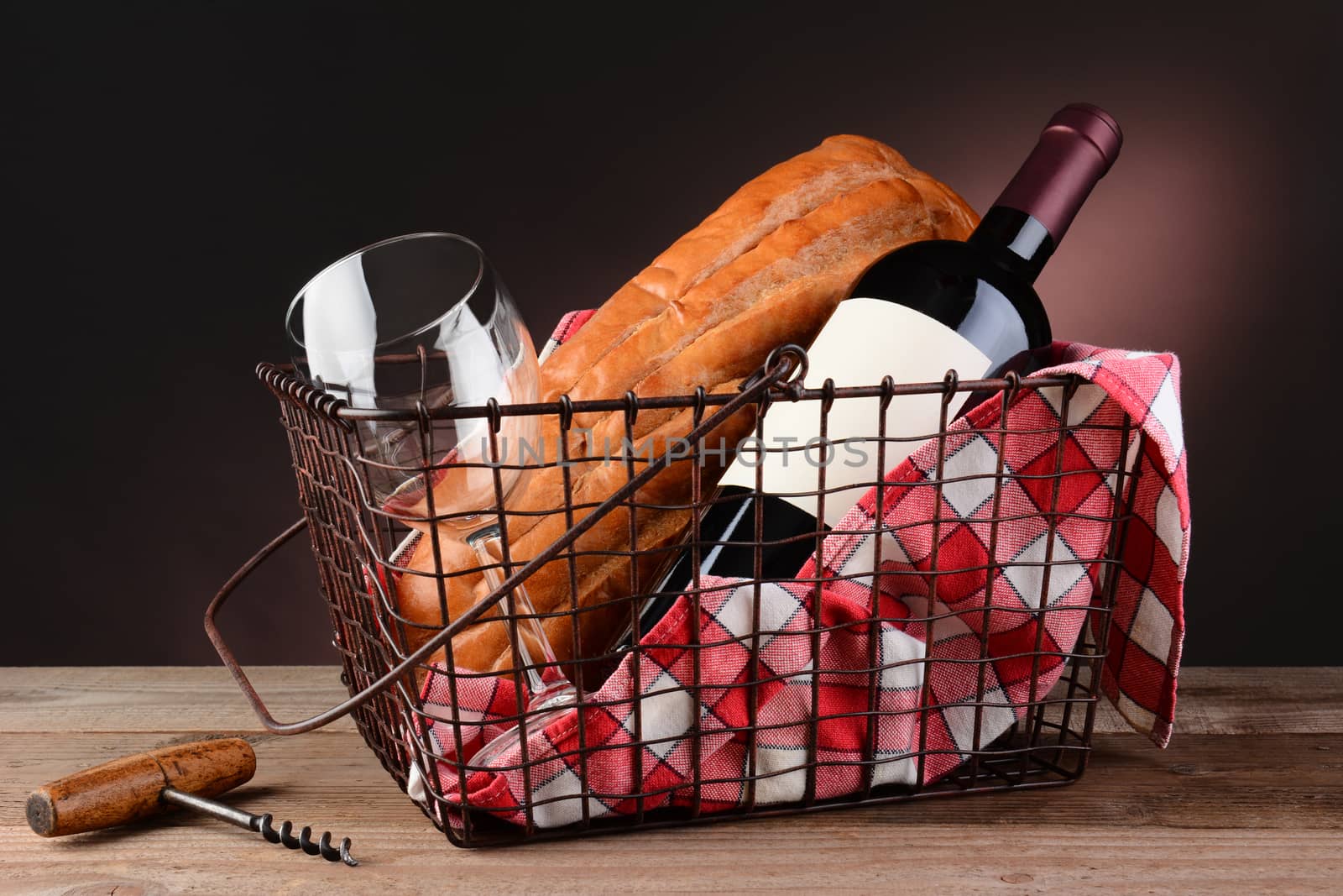 Wine and Bread in Wire Picnic Basket by sCukrov