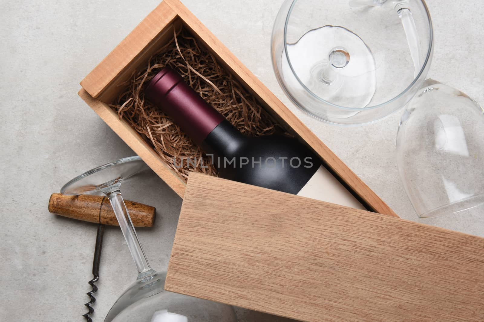 Cabernet in a wood box partially covered by its lid by sCukrov