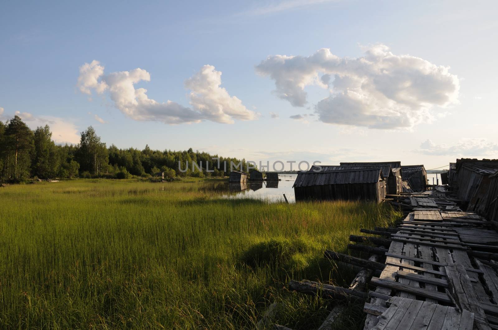 The picture shows abandoned and broken slip docs in a small settlement in Russia's Karelia region