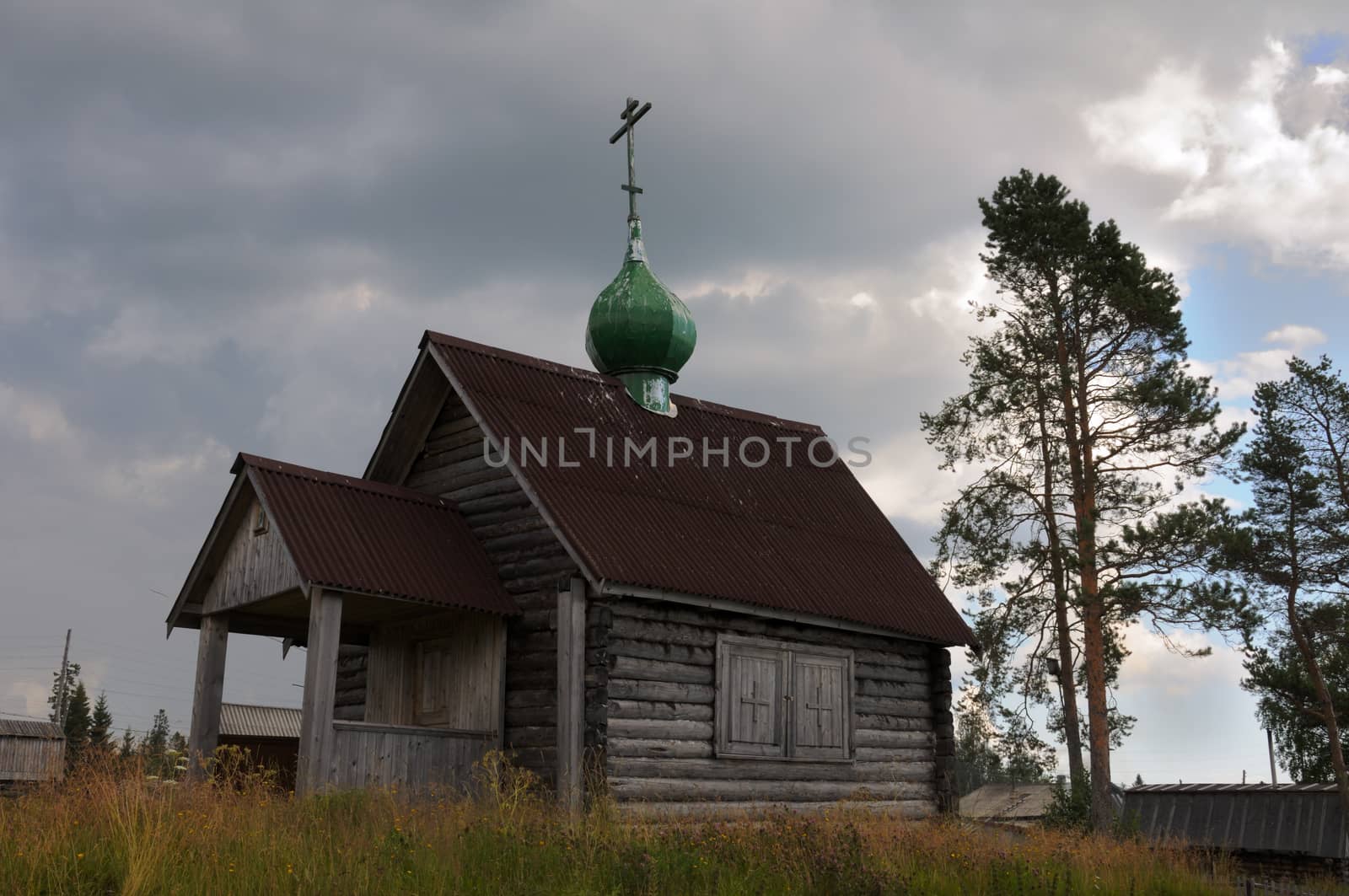 This is the picture of the old rural Russian christian church on a hill