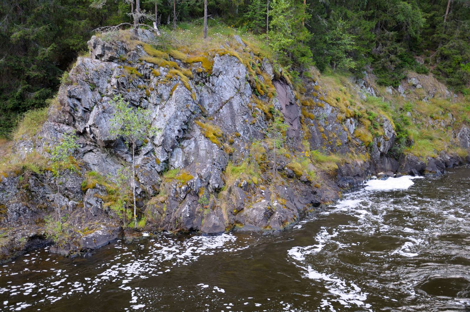 Huge ancient rocks near the Kivach waterfall by nemo269