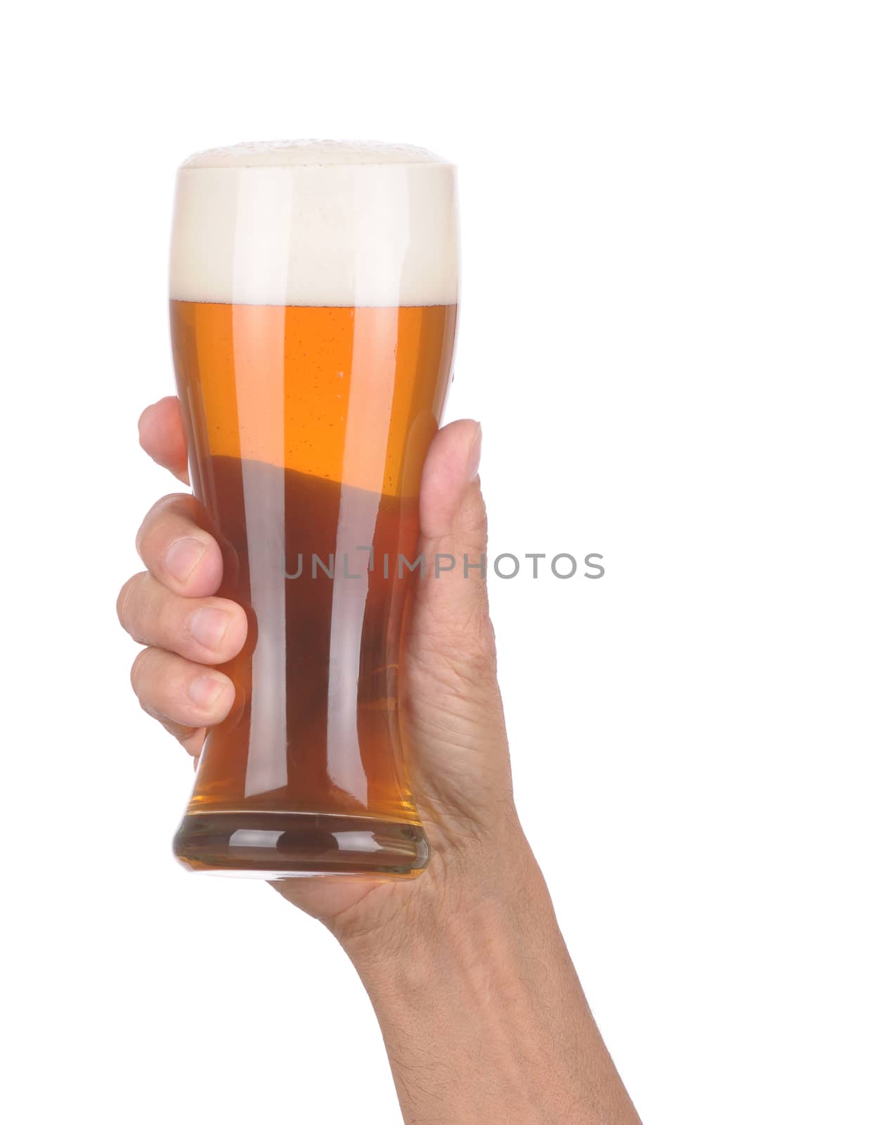 Man's Hand Holding up a Glass of Foamy Beer over a white background
