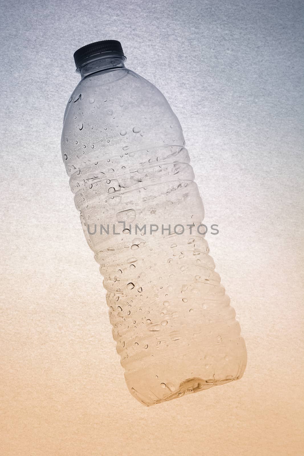 Plastic water bottle on a gradient background  by sCukrov