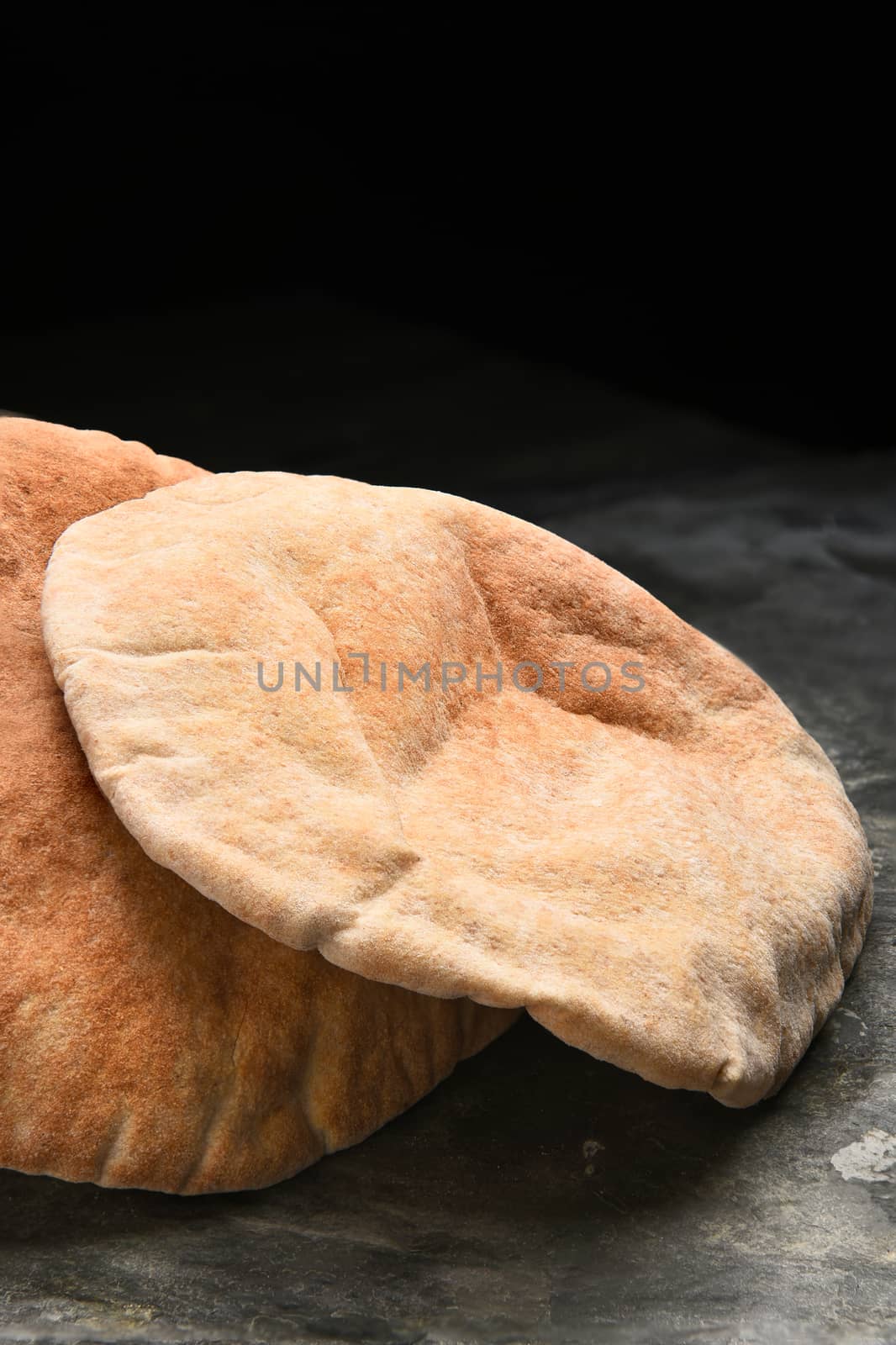 Pita Bread on Slate by sCukrov