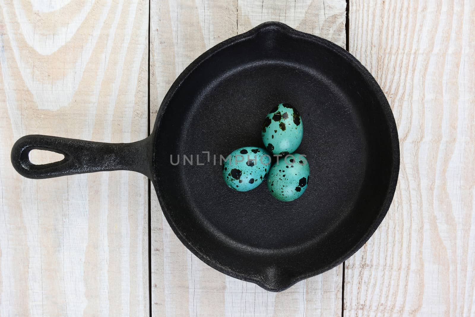 Eggs in Cast Iron Frying Pan by sCukrov