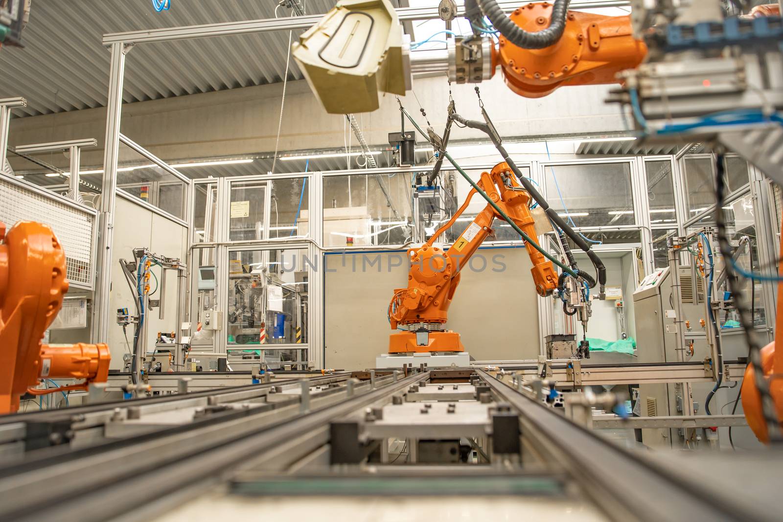 robot arms in the factory performs precise work according to the specified program.