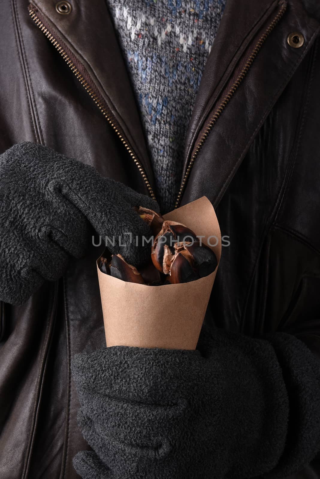 Closeup Man with Bag of Roasted Chestnuts by sCukrov