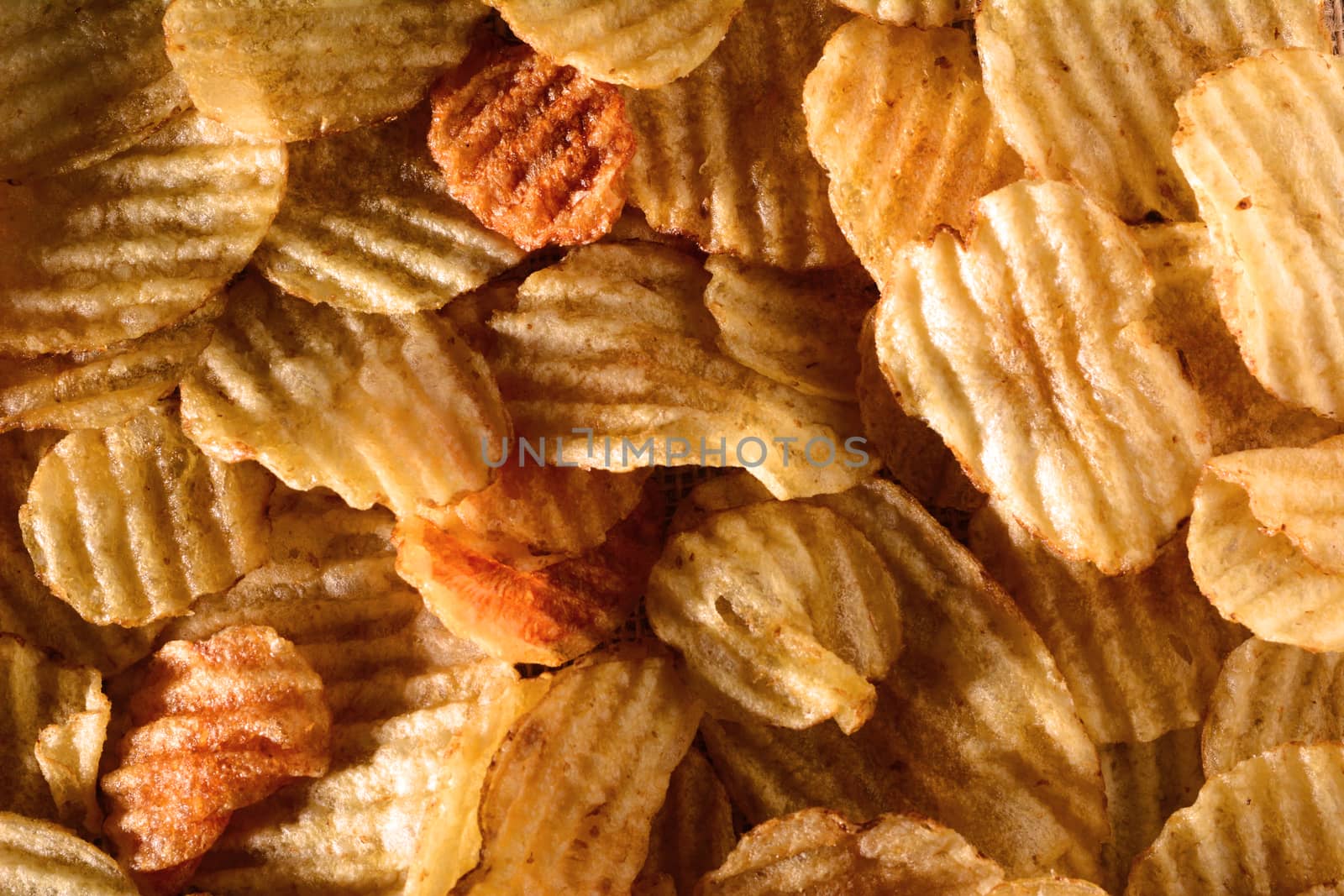 Potato Chip Detail shot from a high angle with warm light.