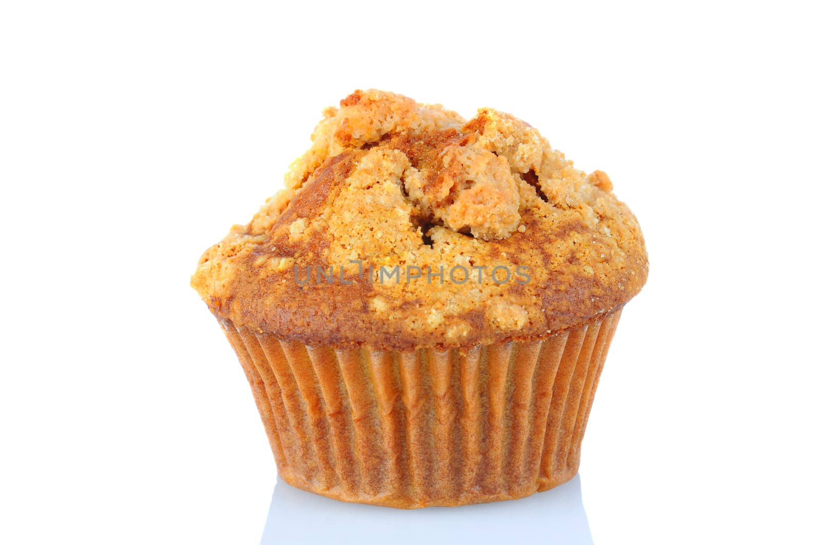 Closeup of an Apple Crumb Muffin isolated on a white background.