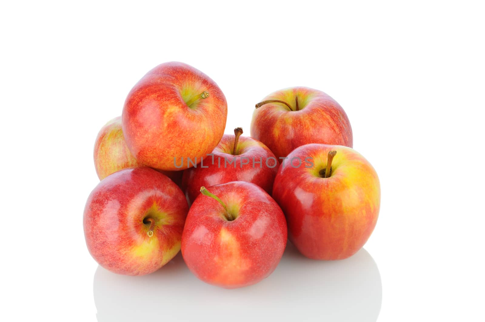 A pile of Gale Apples on white with reflection. Horizontal format.