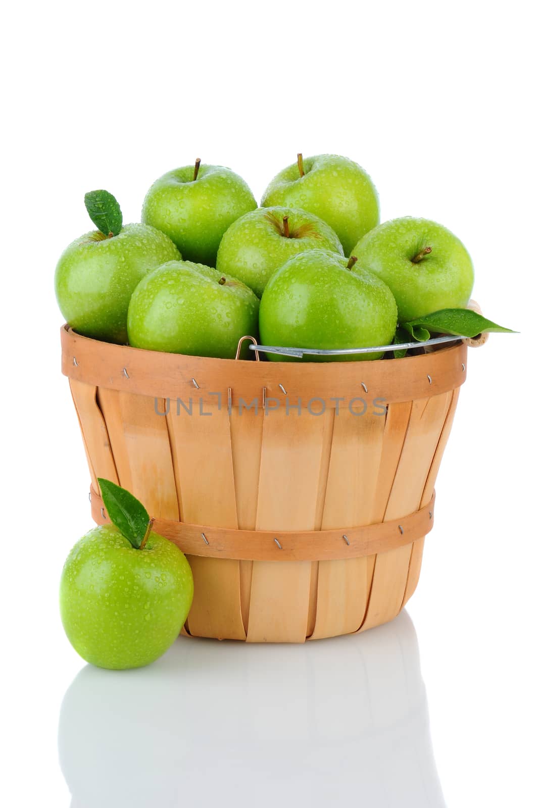 Granny Smith Apples in a Basket by sCukrov