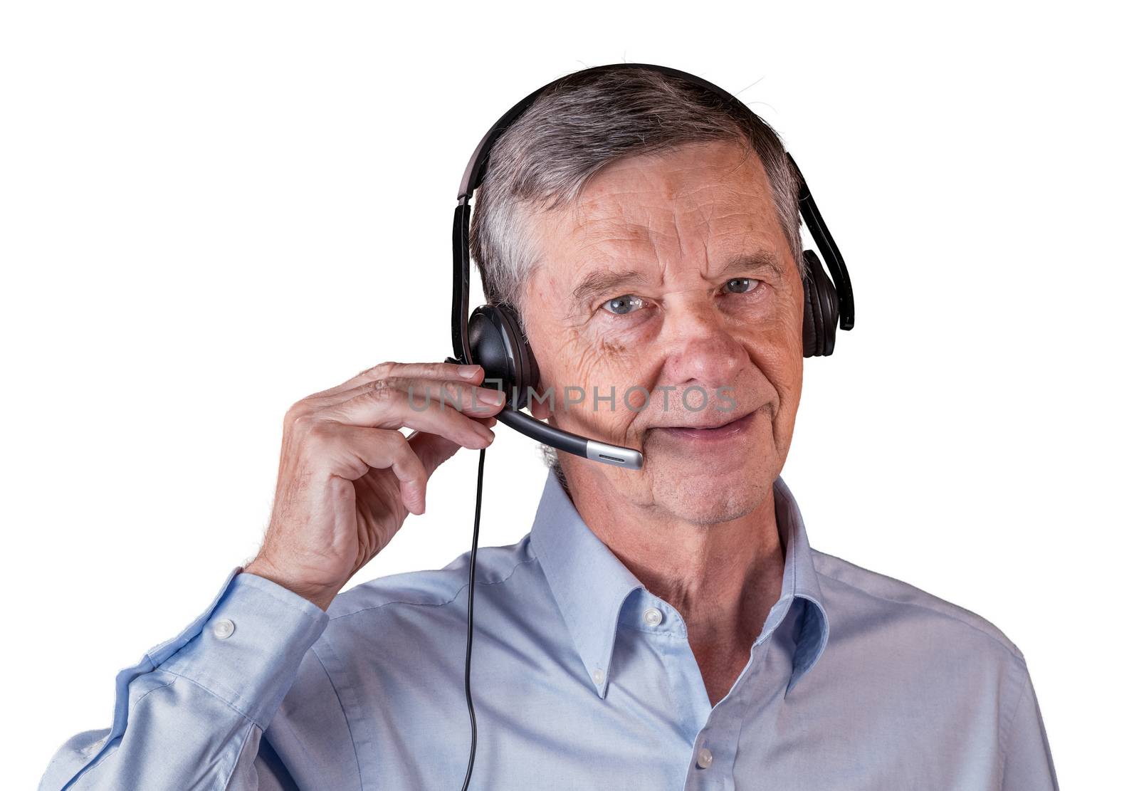 Senior caucasian man using headset to talk to customers or team in work from home. Isolated against white background