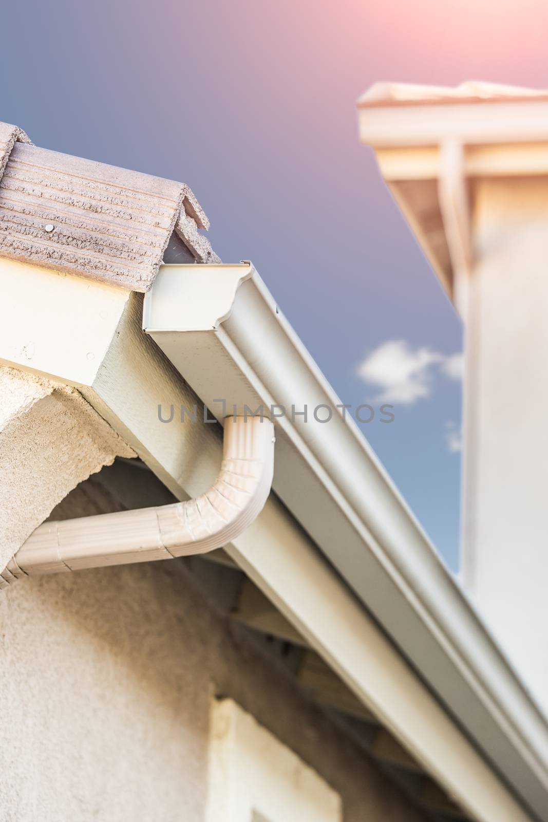 House with New Seamless Aluminum Rain Gutters.