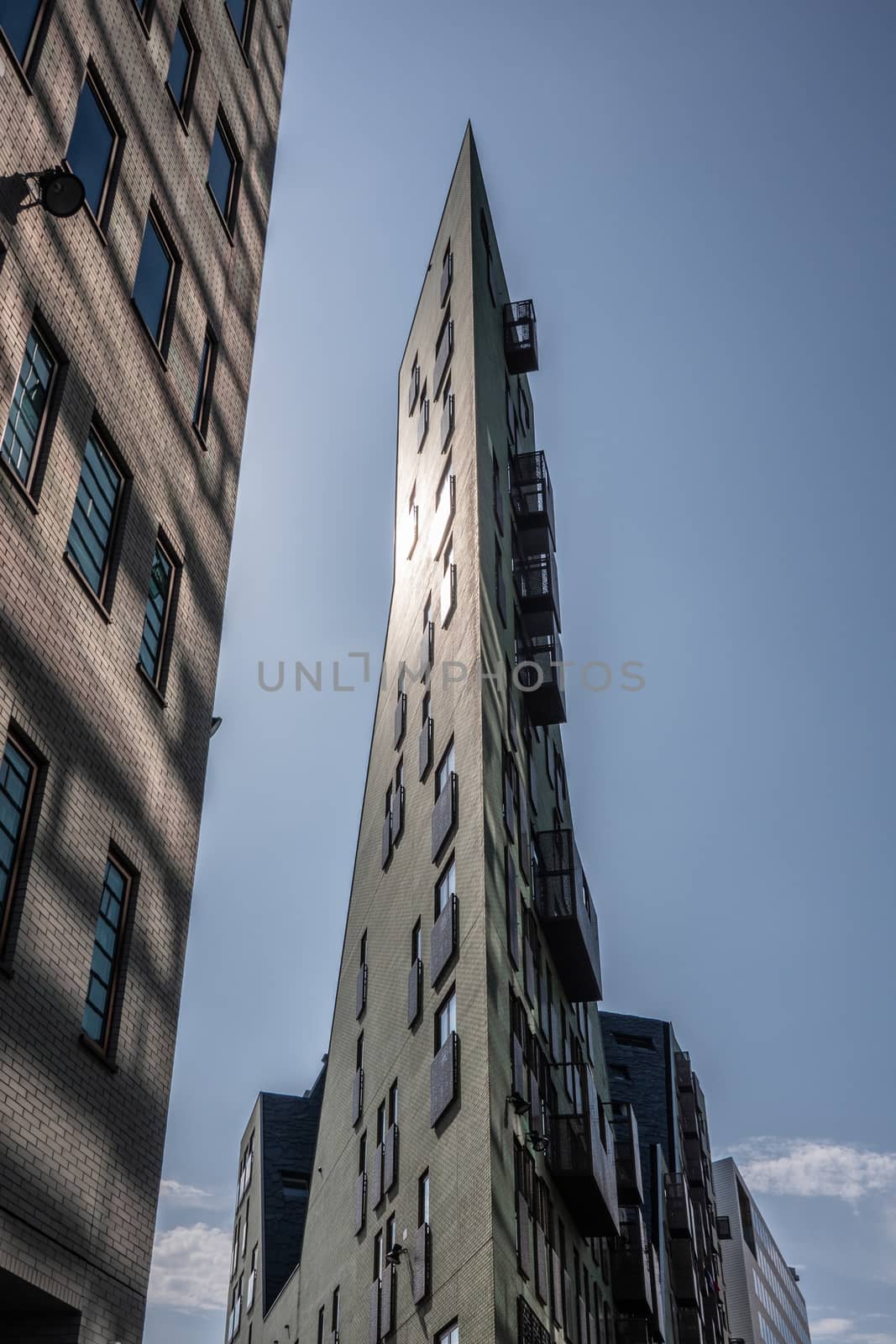 Triangular high rise on IJDok ending in sharp corner, Amsterdam by Claudine