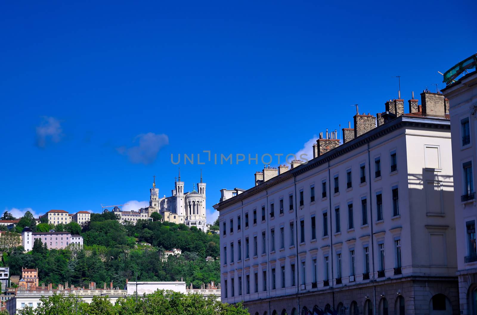 The Basilica of Notre Dame de Fourviere overlooking Lyon, France and the Saone River.