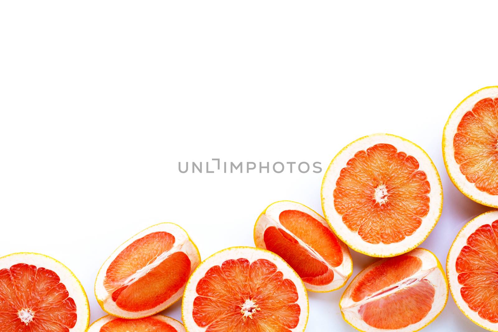 High vitamin C. Juicy grapefruit on white background.