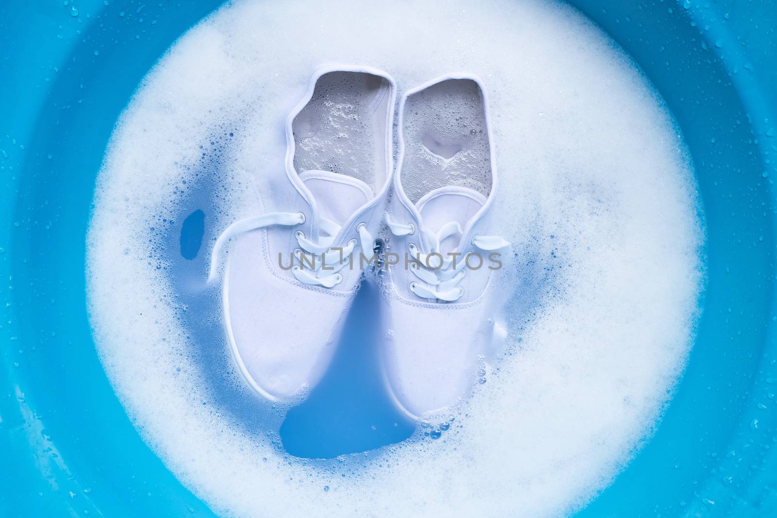Soak shoes before washing. Cleaning Dirty sneakers.