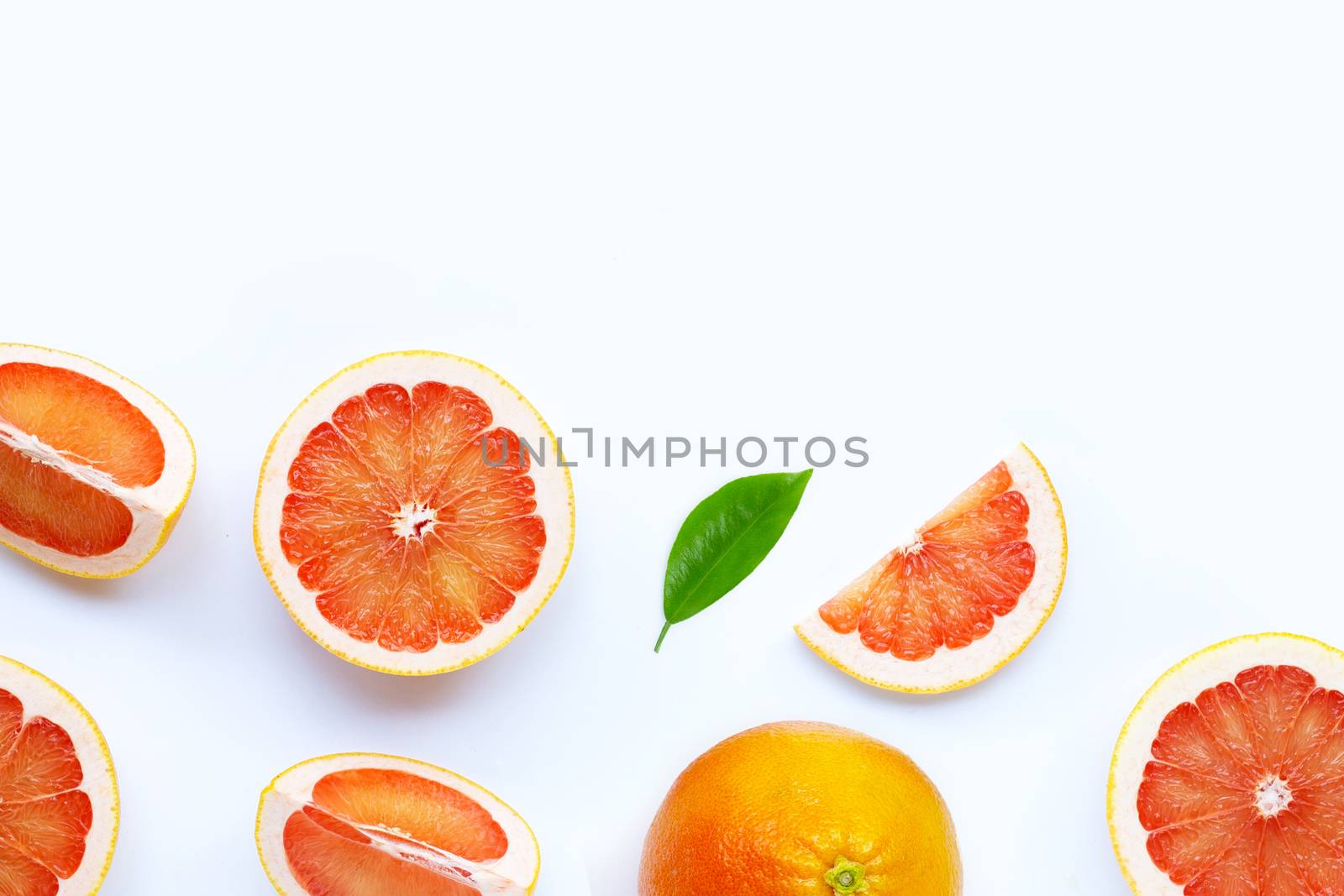 High vitamin C. Juicy grapefruit on white background.