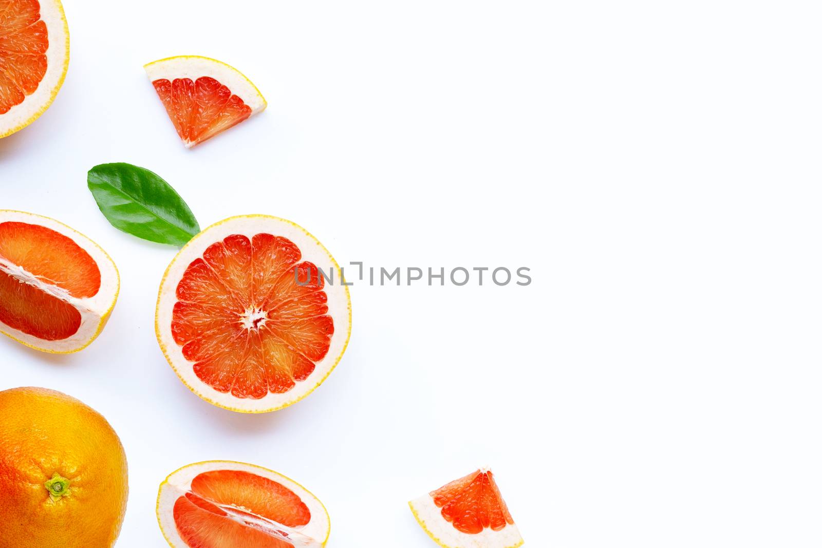 High vitamin C. Juicy grapefruit on white background.