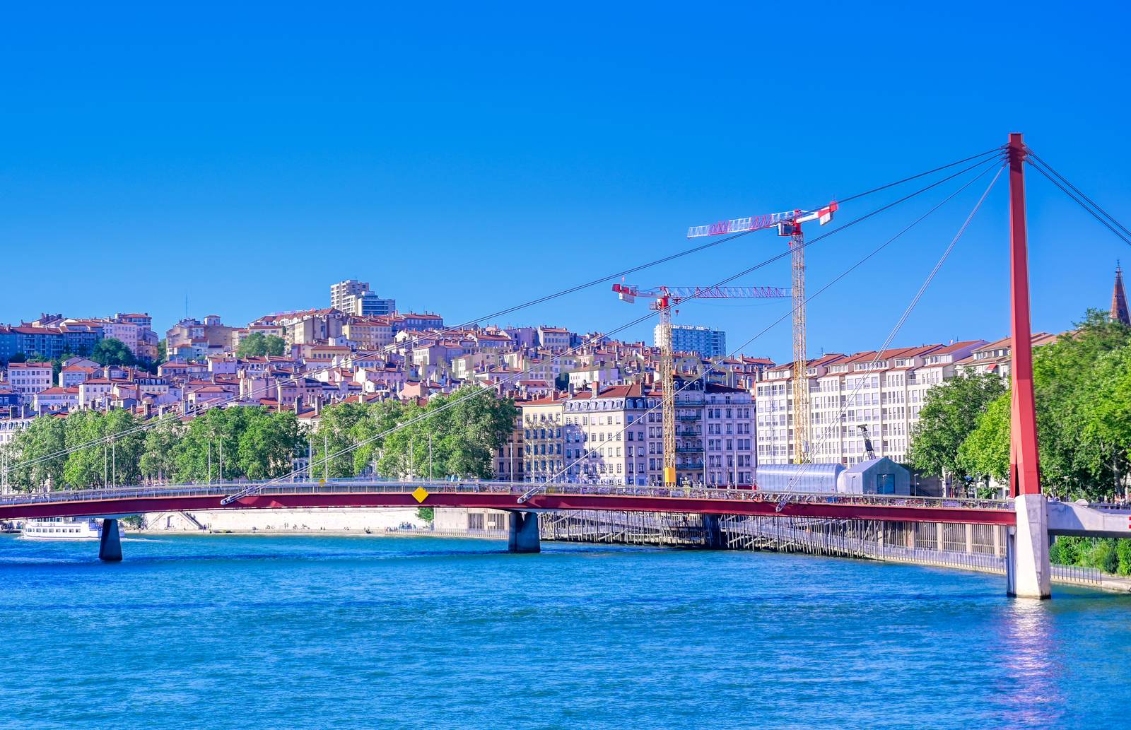 A view of Lyon, France along the Saone river in the afternoon.