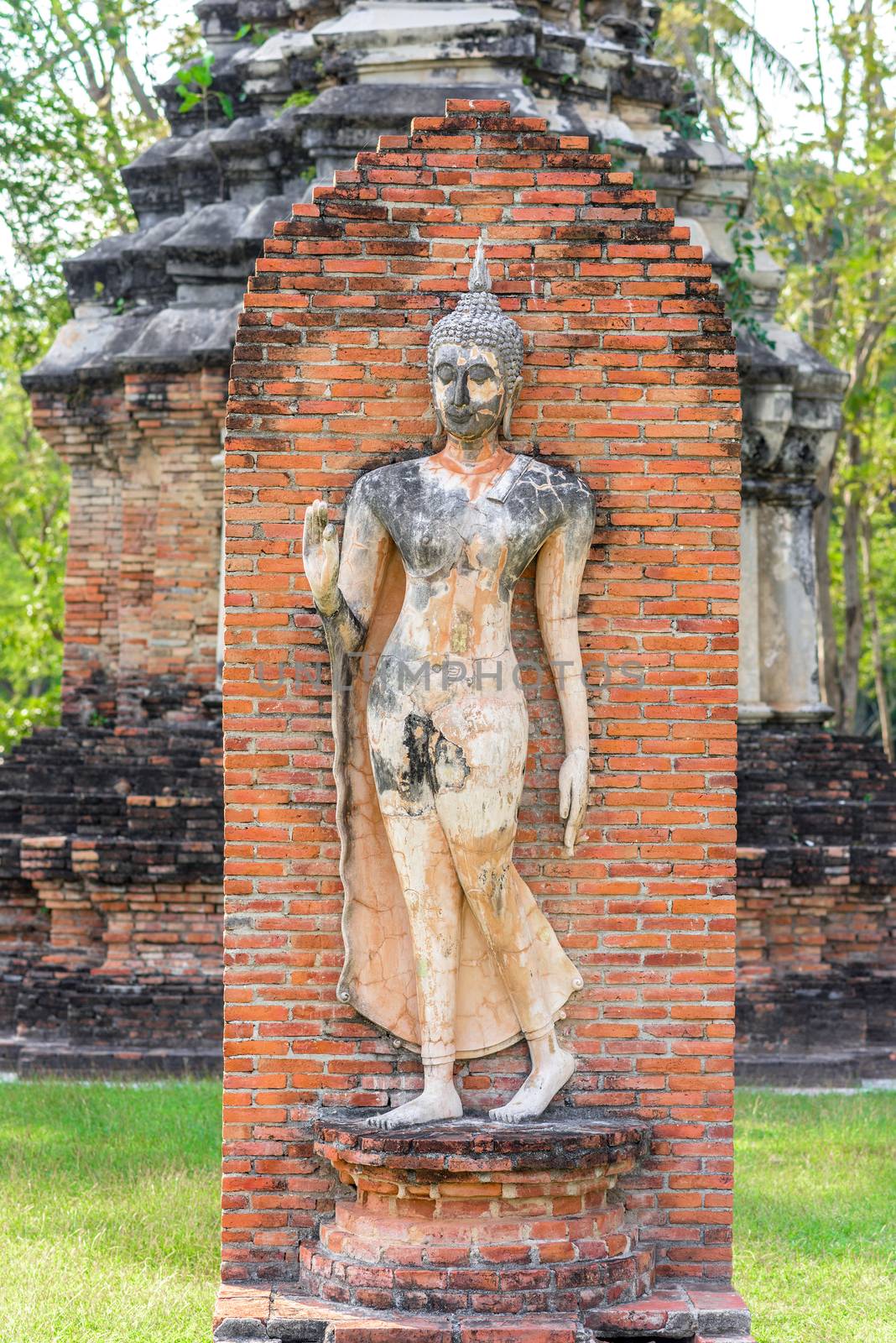 Ancient Buddha Statue in Sukhothai historical park in Sukhothai, Thailand.