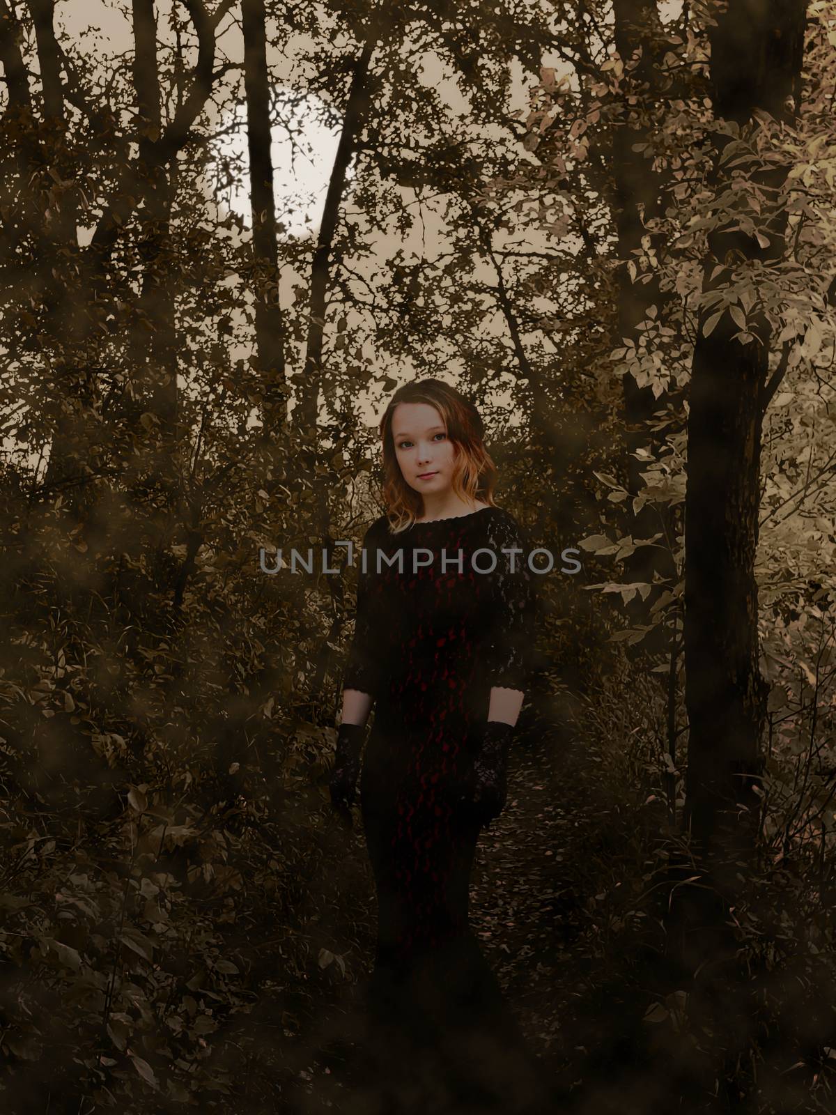 Portrait of the girl walking in the woods. Full moon. Fantasy.