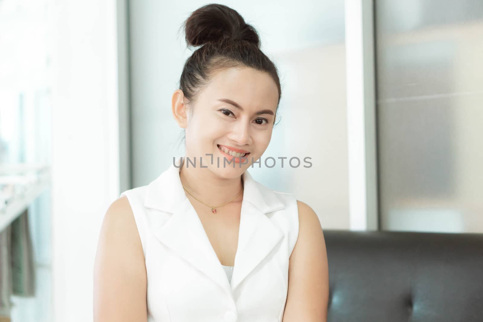 Business woman with smiling and looking at camera for ready work by pt.pongsak@gmail.com