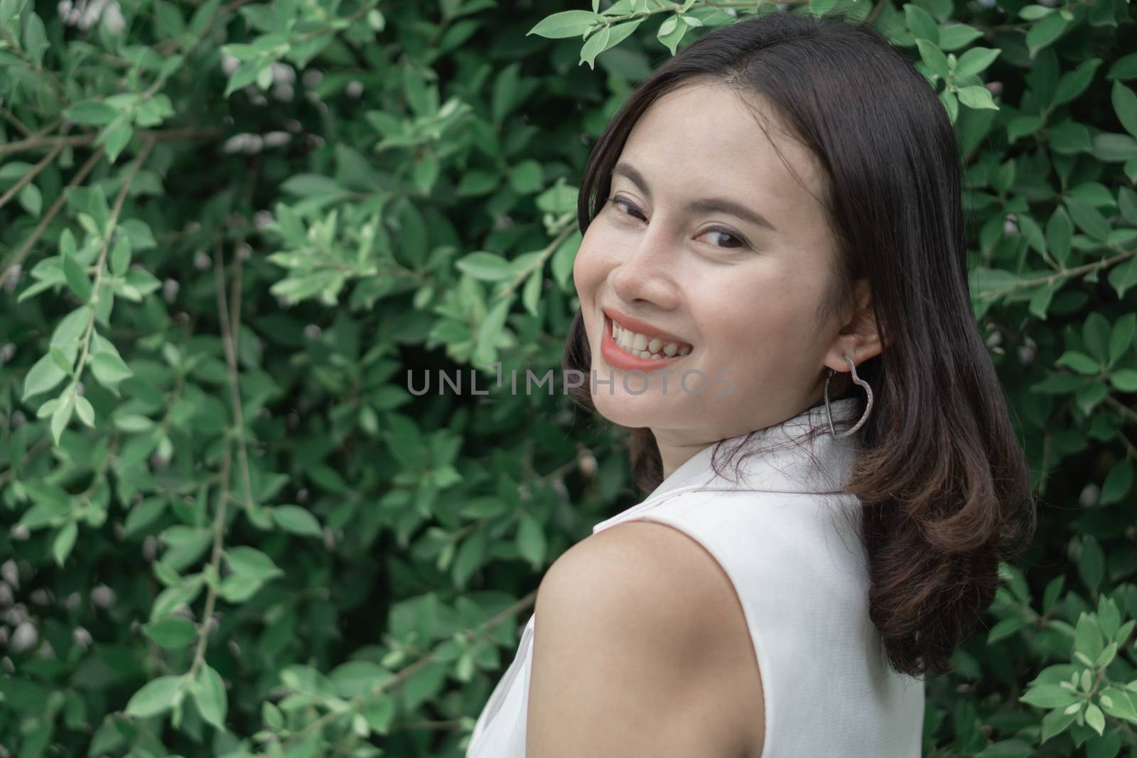 Woman happy feeling with green nature background by pt.pongsak@gmail.com